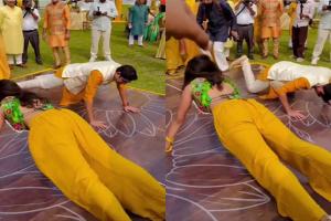 Viral Video: ହଳଦୀ ରସମରେ ବର-କନିଆଁଙ୍କ ‘ପୁସ୍-ଅପ୍’ ଚ୍ୟାଲେଞ୍ଜ, ବରକୁ ହରାଇ ବାଜି ମାରିଲେ କନିଆଁ, ଭିଡିଓ ଭାଇରାଲ